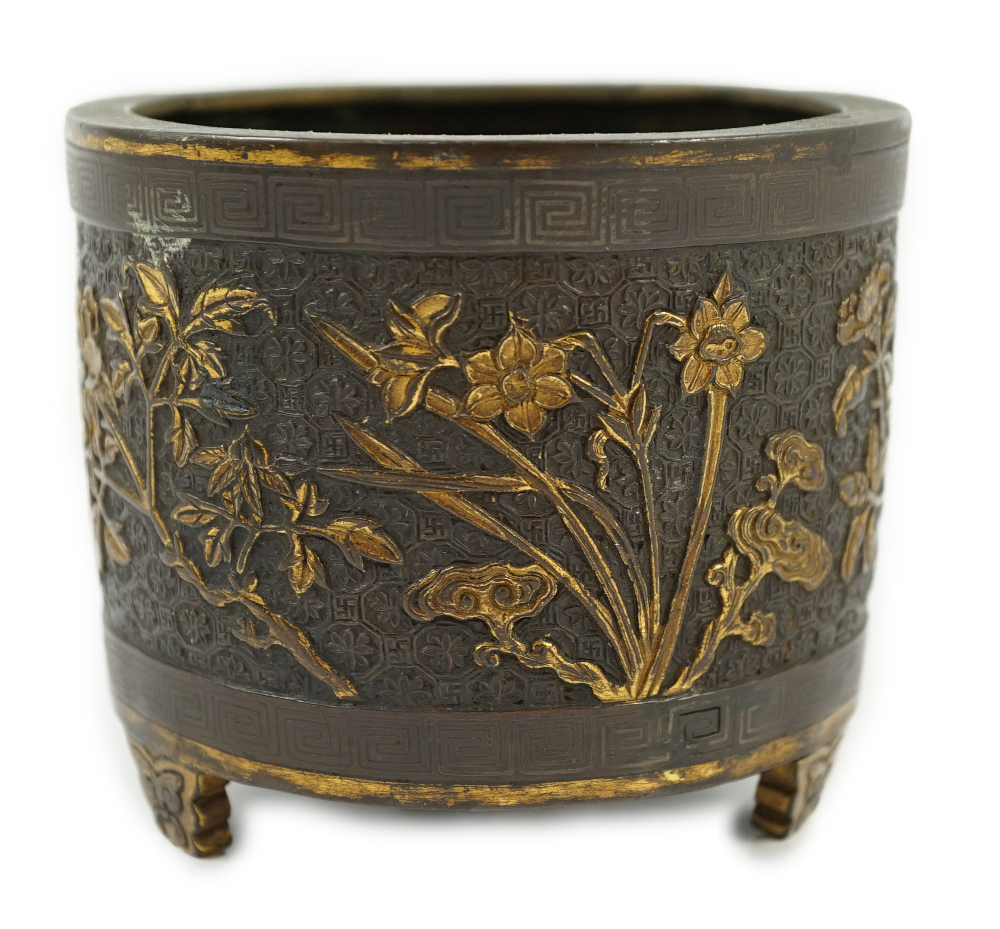 A Chinese parcel-gilt and silver inlaid bronze tripod censer, Yunjian Hu Wenming mark, 16th/17th century, small dents and three rim splits